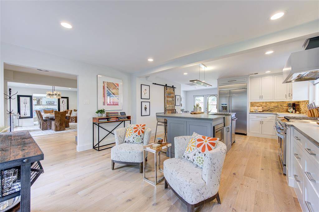 The Seller spends most of their time in this sitting room off the gourmet kitchen. Once you step foot into this amazing kitchen, you won't want to leave either!