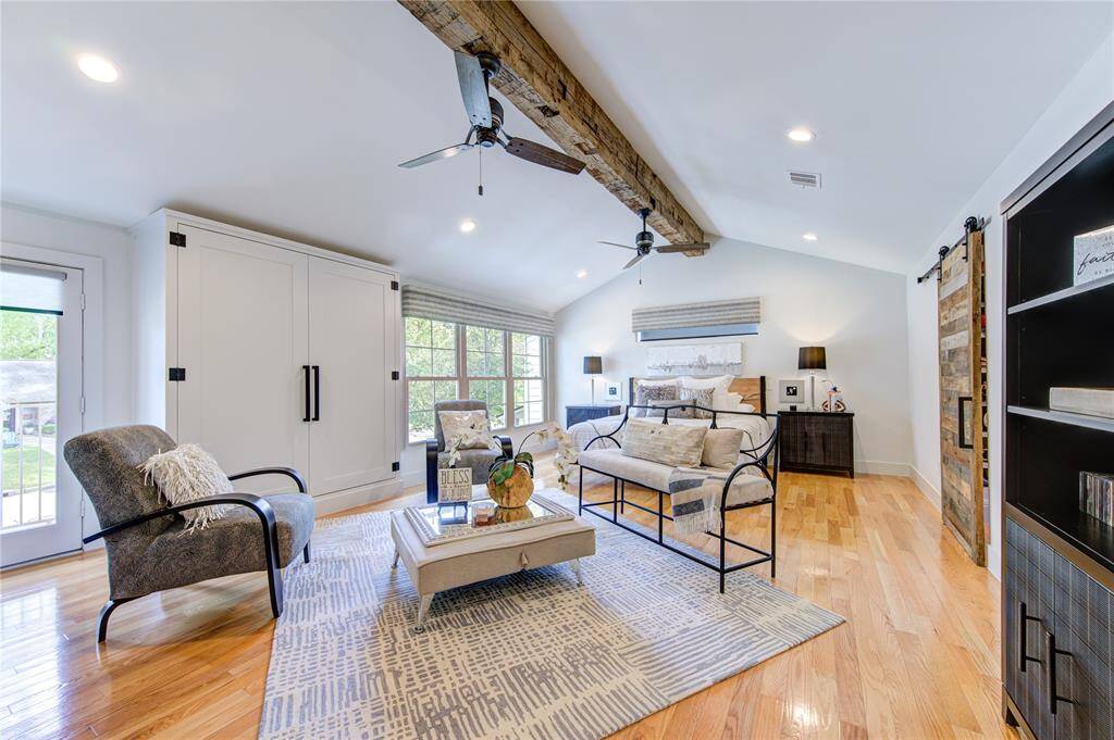 This expansive second floor primary retreat is something you do not find often in Nottingham Forest. This space was expanded and the ceiling raised into a vaulted ceiling with a reclaimed wood beam and recessed lights. This room is now double the size of a standard primary suite and is a true escape.