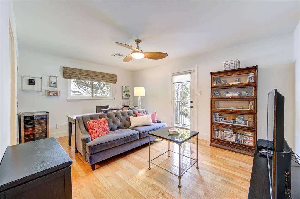 There are four bedrooms and 3 bathrooms on the second floor, each with direct access to a bathroom and hardwood floors throughout. This room is currently been converted to a home office and also has a door leading to the balcony overlooking the front yard.