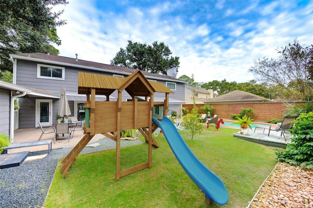 VIRTUALLY STAGED:  With all this green space in the backyard, there is plenty of space for a play structure.