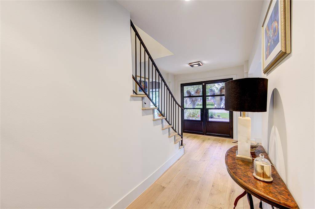 The double iron front doors and French Oak floors are what everyone buyer is looking for, and this home has it all!
