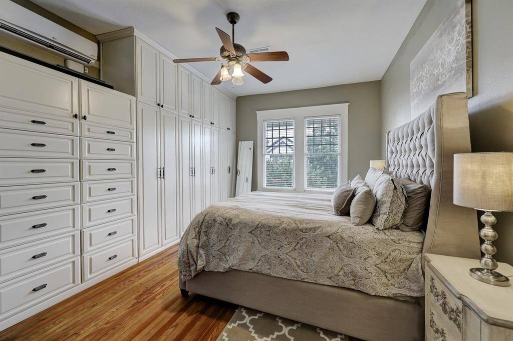 Secondary bedroom upstairs with ample storage and closet space.