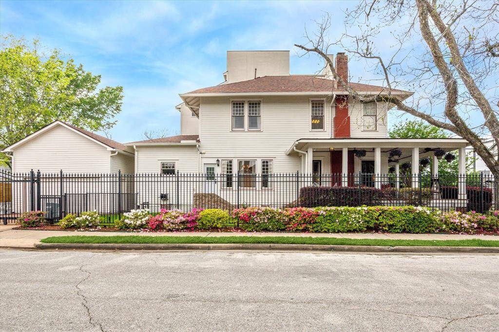 View from Hopkins Street shows the Oversized Garage with Tons of loft space! No need to park your cars on the street!