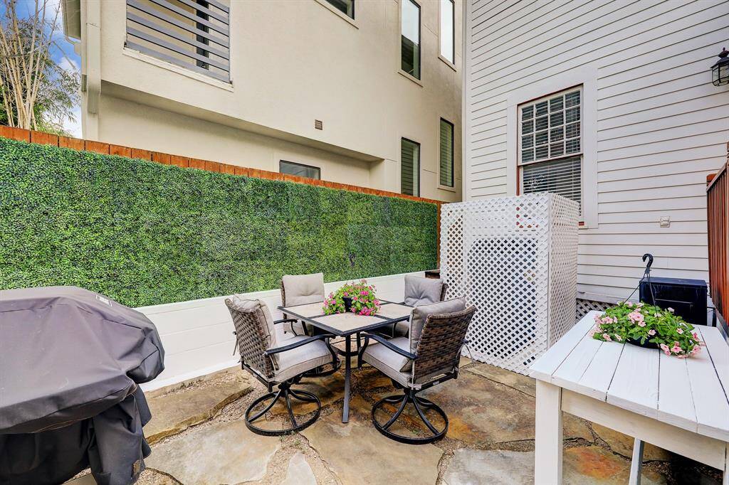 Back patio off the Kitchen for outdoor cooking or entertainment.