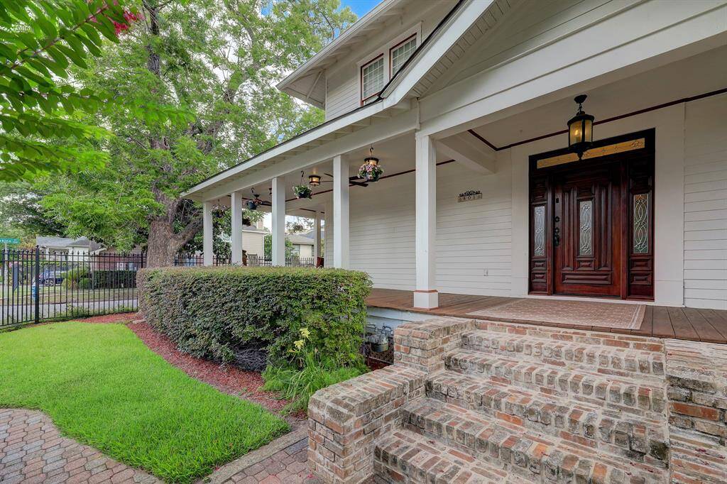 Enter the front of the residence using the designer antique brick walkway and kiln dried wooden porch.
