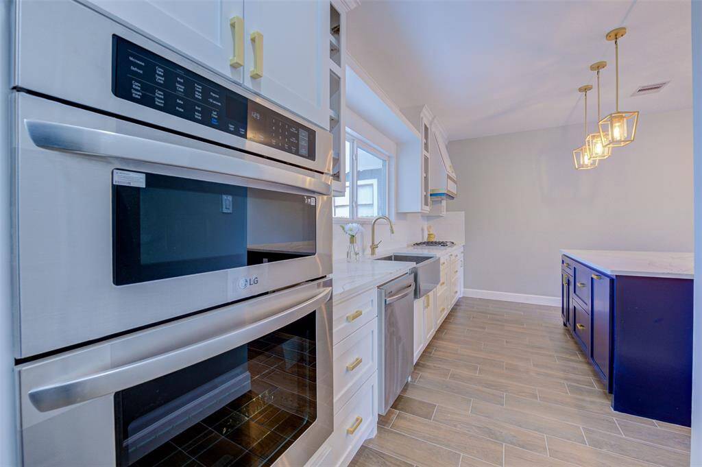 Chef's kitchen with a Modern touch.