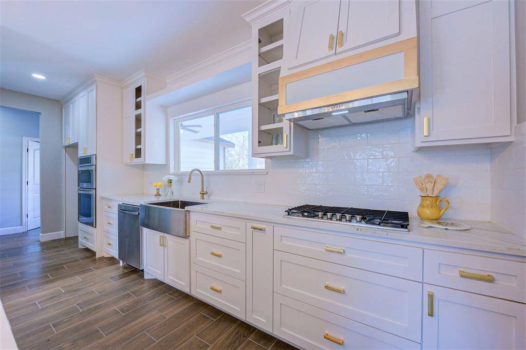 All custom cabinetry throughout.