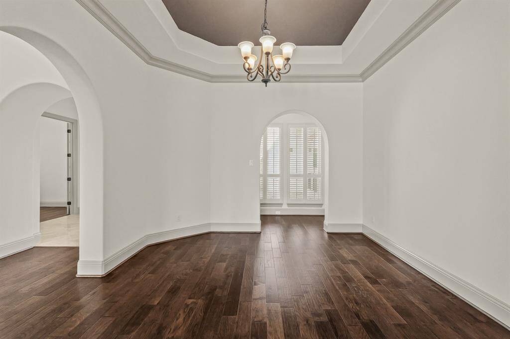 Formal dining with recessed ceiling and accent paint!
