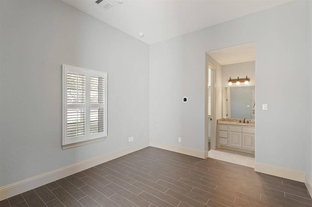 Guest house with tile wood floors - great office option as well!