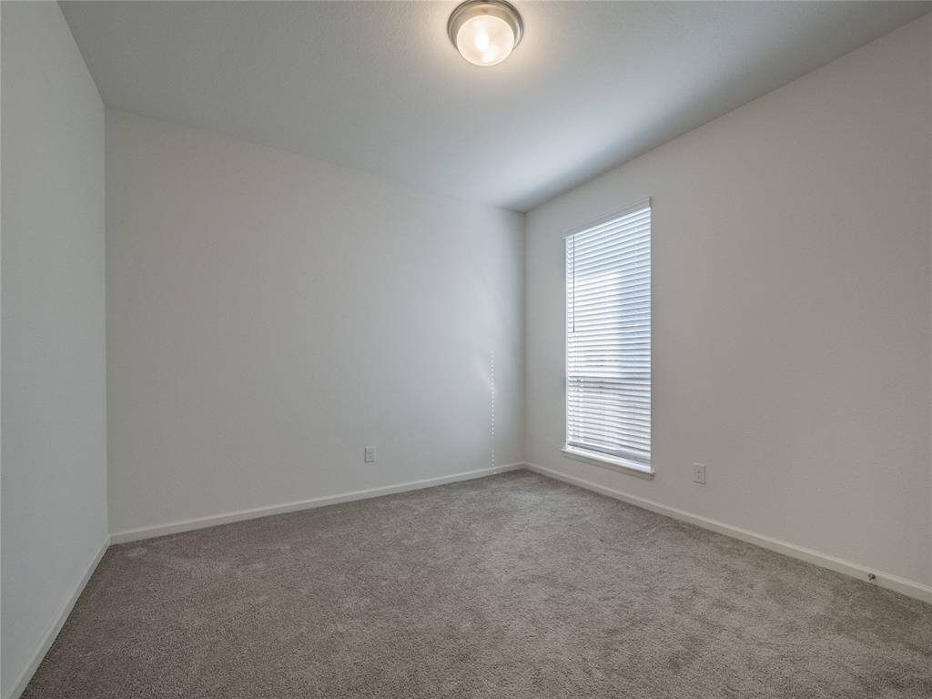 right beside that one is bedroom 4 hardly ever used and carpet is also like new with the same oversized window