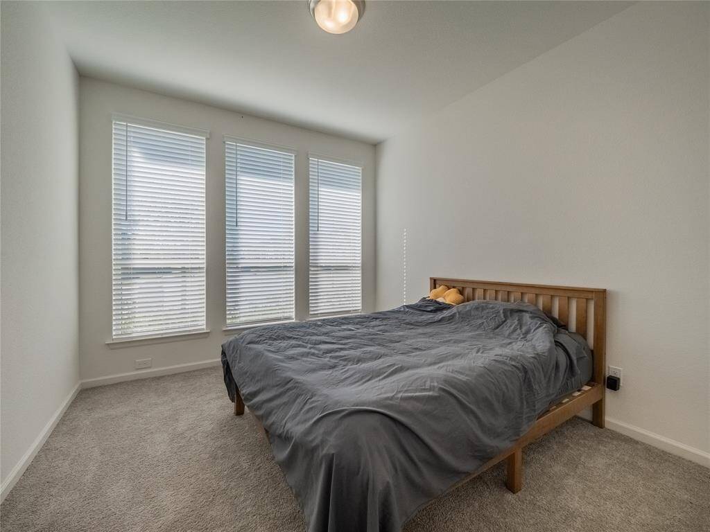 your guest suite with private bath faces the street has oversized windows for natural light used very little carpet is still like new