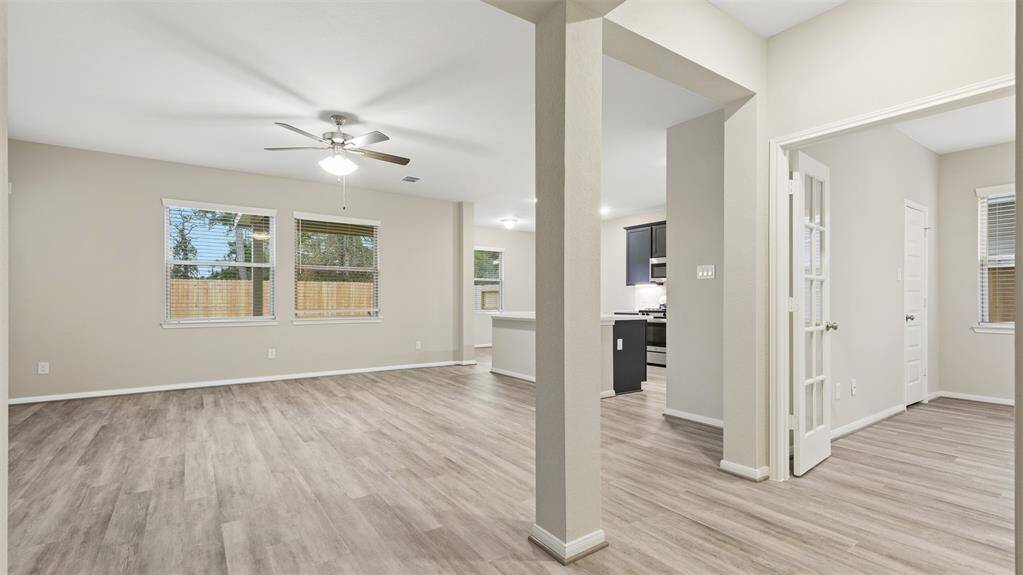First level living room kitchen with flex room downstairs that could be used as 4th bedroom or home office
