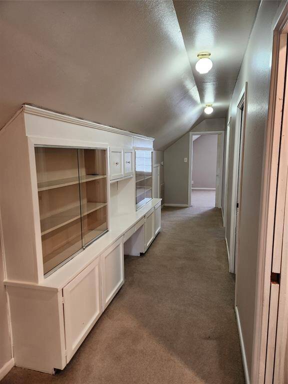 Hallway connecting upstairs bedrooms