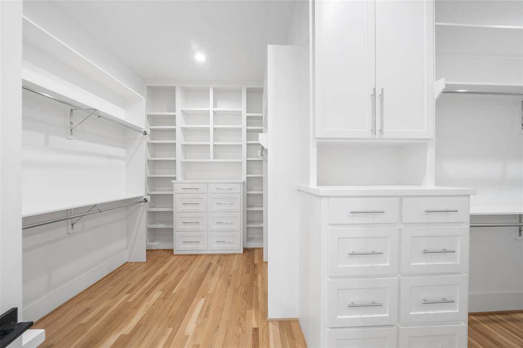 Spacious and functional Master closet.