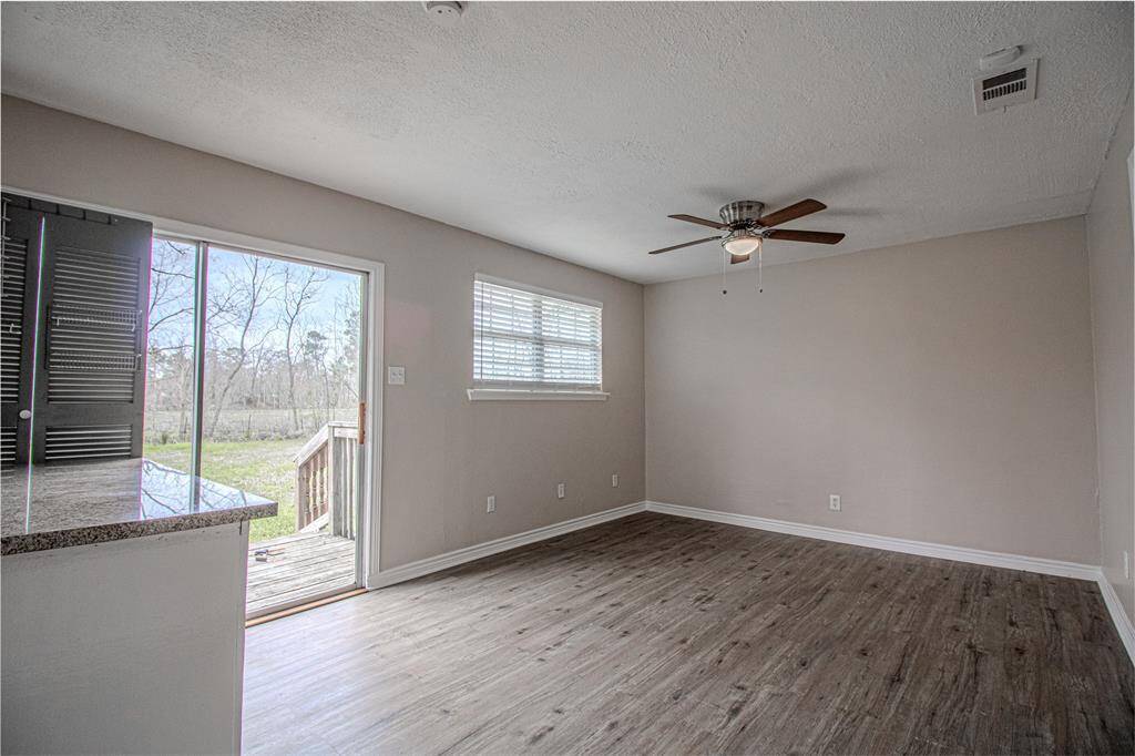 Spacious dining area with a great view of your backyard!
