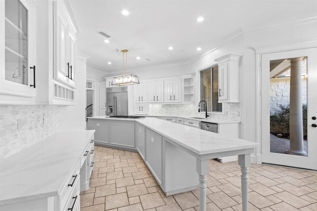 Impressive Mother of Pearl inspired backsplash.