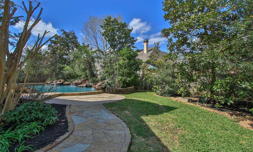 In addition, there’s plenty of green space beside the pool.