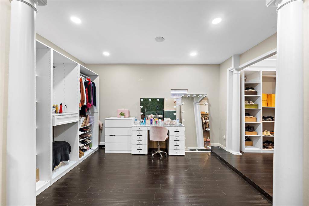 Columns and open transitions give the second flex room a stylish touch, making it a seamless extension of the primary suite with endless possibilities for use.