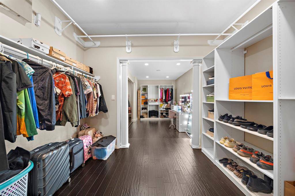 The expansive walk-in closet is a homeowner's dream, offering ample shelving, hanging space, and custom storage solutions to keep everything impeccably organized.