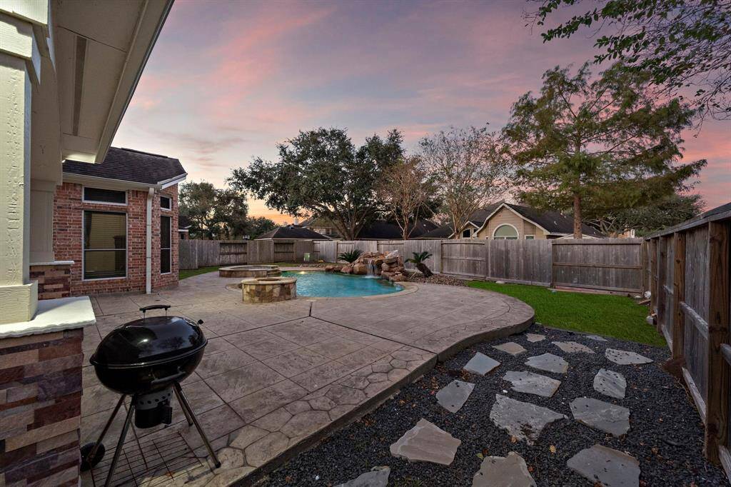 Surround yourself with comfort and functionality in this stunning outdoor retreat, boasting a private and meticulously maintained fenced yard.