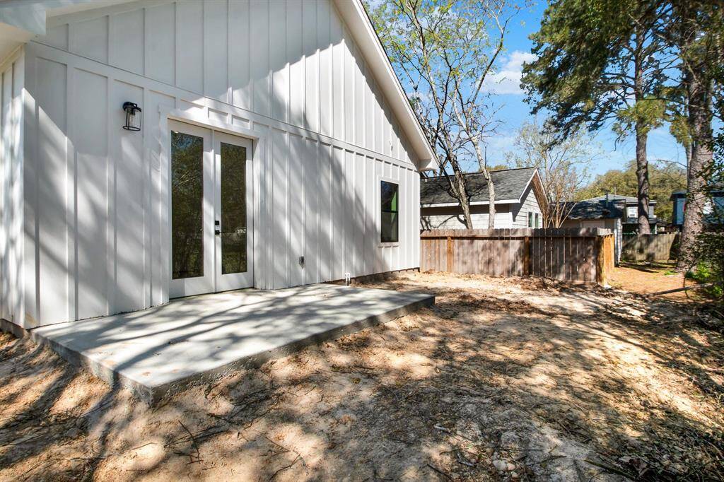 The backyard is a blank canvas for you to design the landscape of your dreams surrounding the back patio.