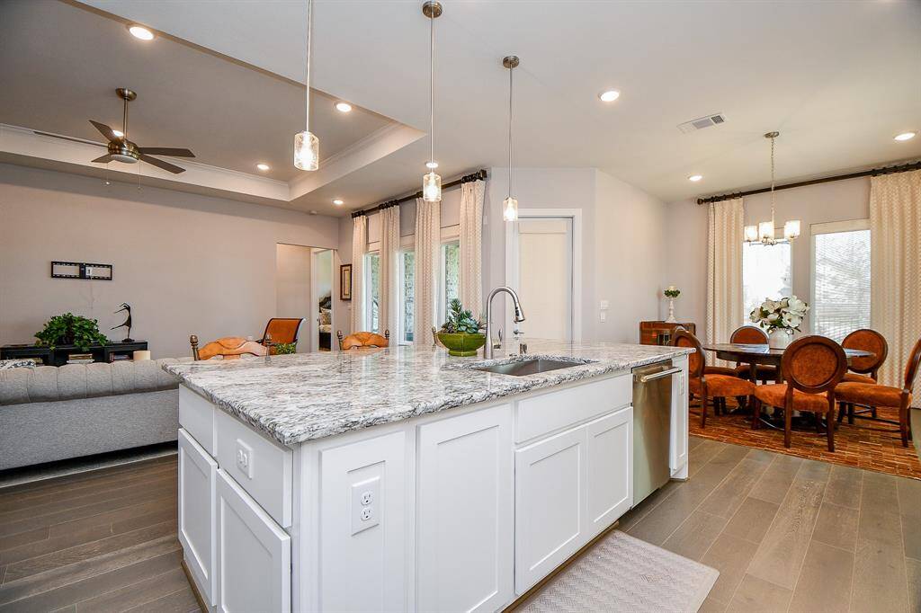 All of the windows have custom drapes and blinds that can be fully opened to enjoy the view through the floor to ceiling plate glass windows.