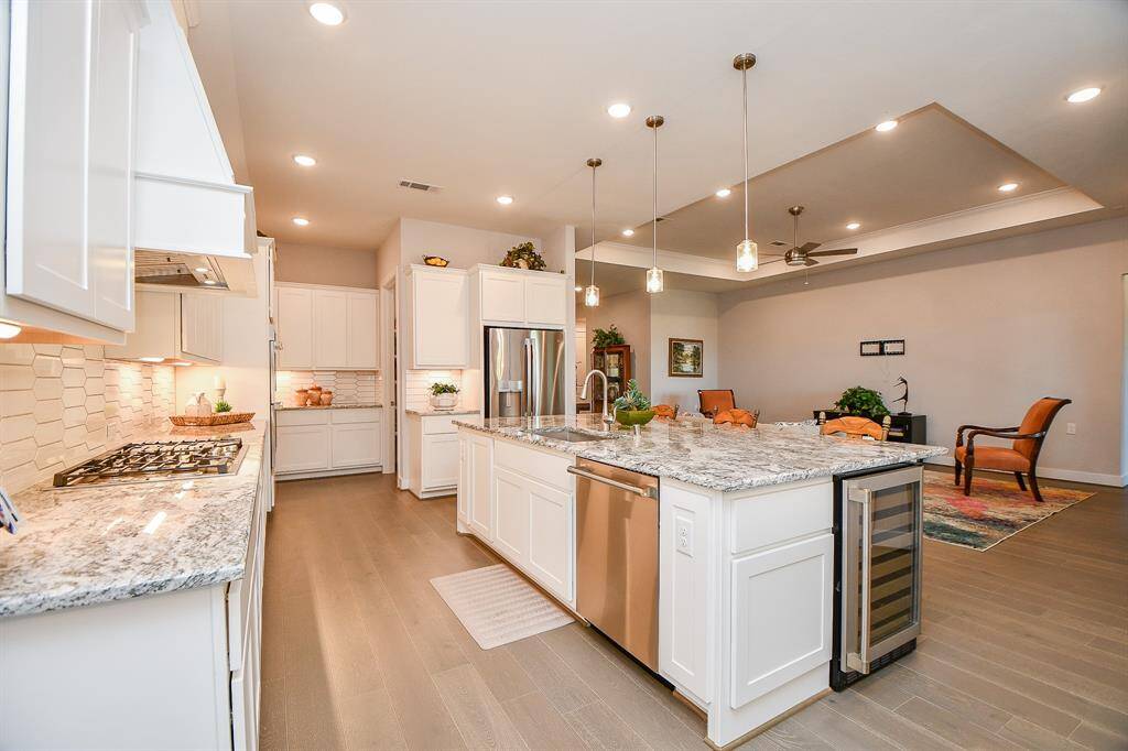 Please note the extra nook at the end of the kitchen. It is a perfect space for a coffee bar!