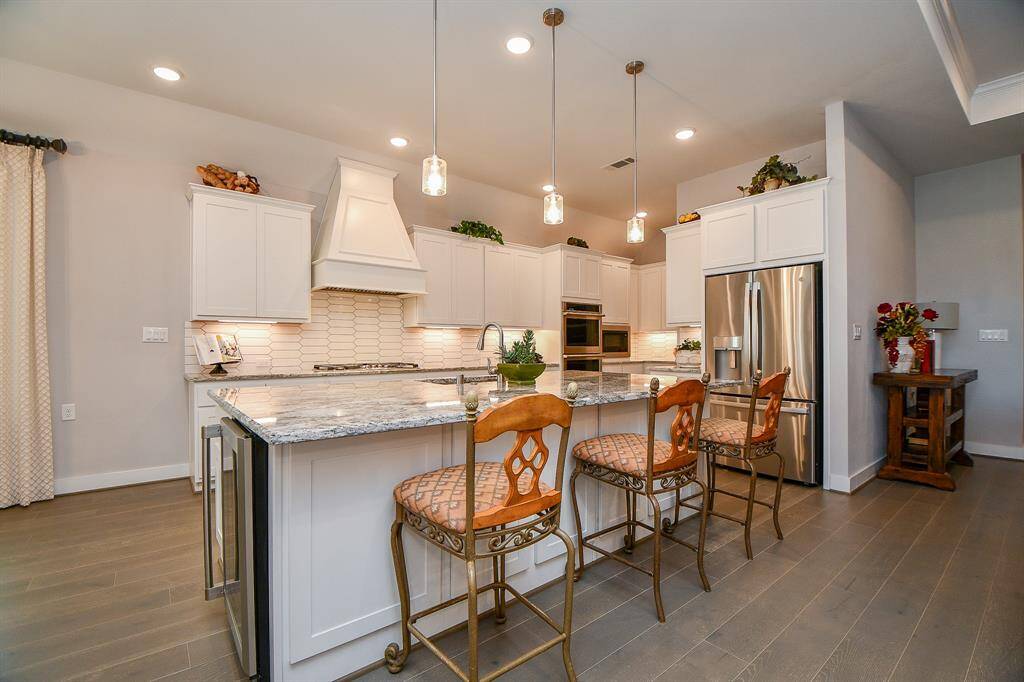 Stylish and functional kitchen featuring soft-close cabinets and drawers for a seamless, quiet touch. Designed for convenience and elegance, offering ample storage with modern finishes.