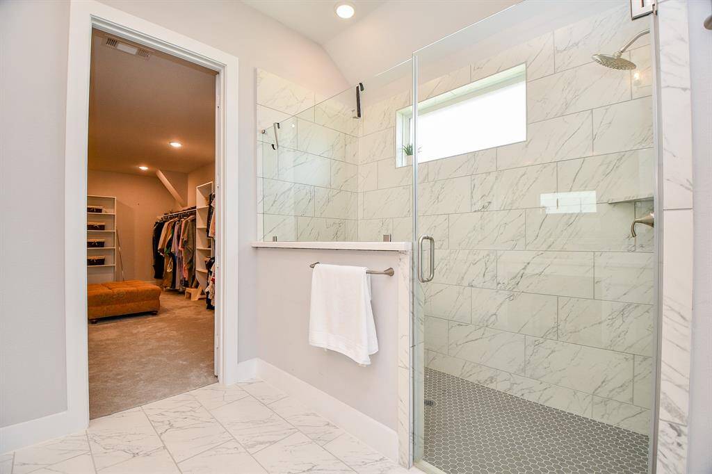 This oversized shower is not only gorgeous, it is also wheelchair accessible.