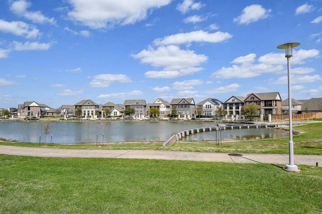 This premium private lot is nestled at the edge of a picturesque lake.