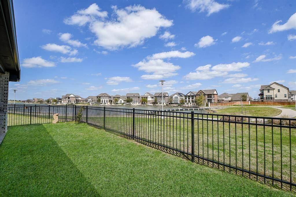 The backyard has enough room for planting a garden and running area for your pets.