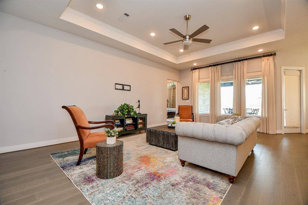 The primary bedroom is tucked back in the corner for additional privacy