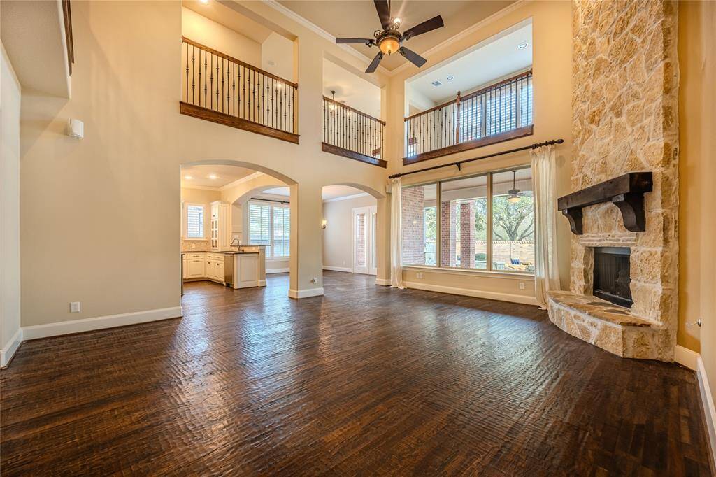 The study is further enhanced by elegant wood moldings and 12-lite French doors, allowing for an abundance of natural light while maintaining a sense of privacy and sophistication. These features add both style and functionality to the space.