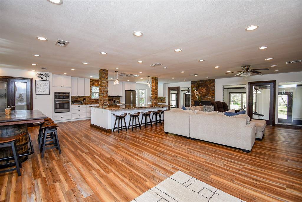 Step into this beautifully updated open floorplan, where bright and airy spaces create a warm, welcoming atmosphere. The design offers plenty of room for gathering with friends and family, making it the perfect place to create lasting memories.