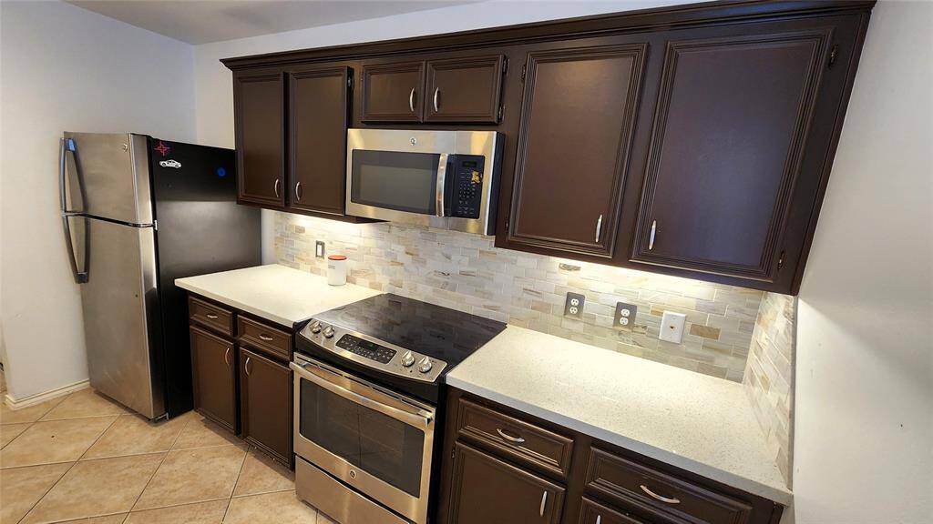 Kitchen - Includes the Refrigerator.