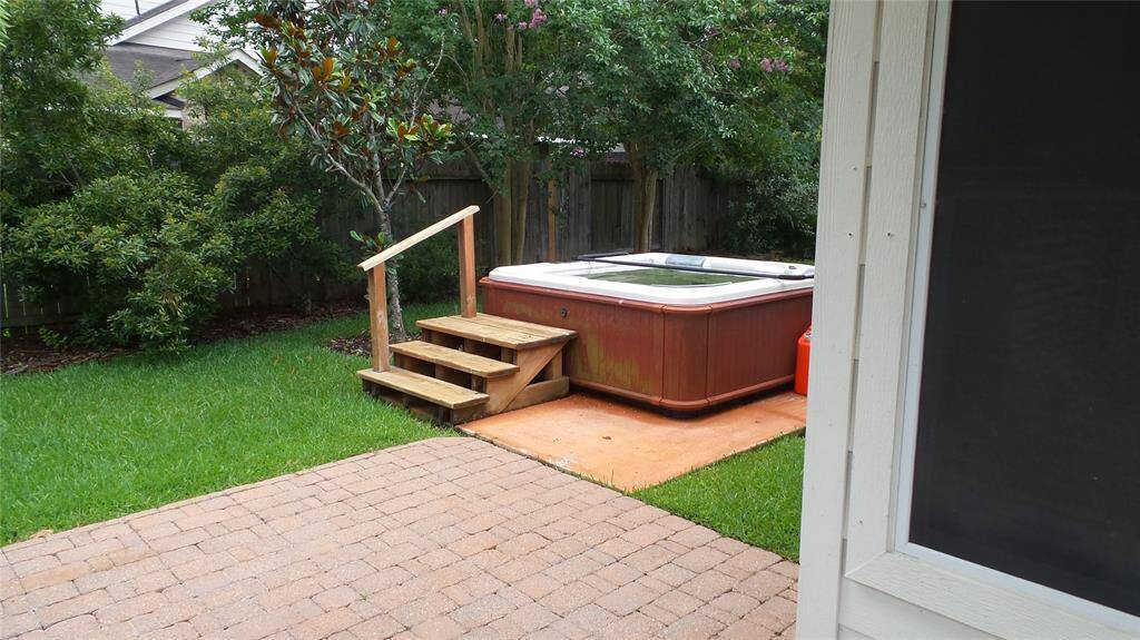 Fenced Backyard with hot tub