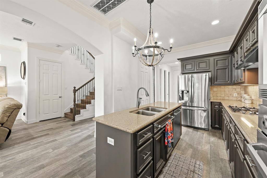 Ample cabinets, under cabinet lighting, wall oven and microwave