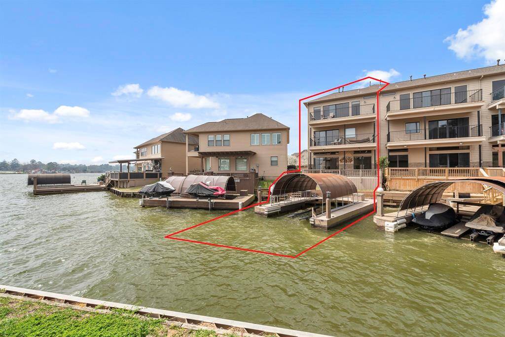 Corner unit has private Covered boat and jet ski lifts