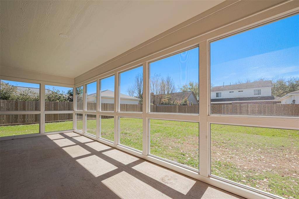 Screened in patio with new screening that you can relax and drink your morning tea or coffee overlooking the spacious back yard.