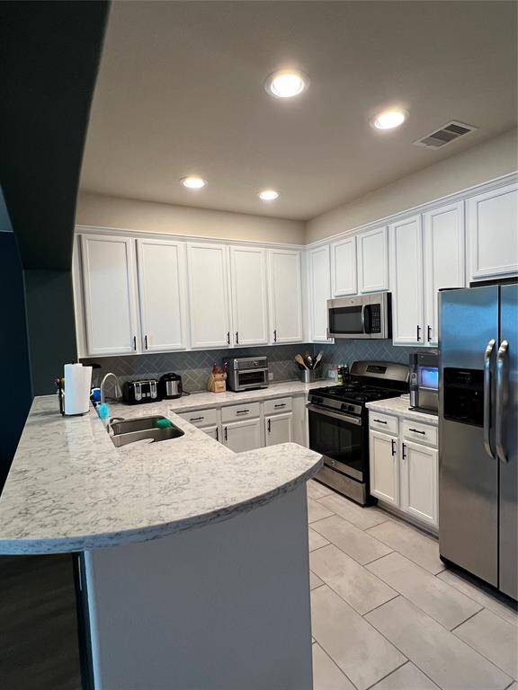 Updated kitchen with beautiful granite countertops