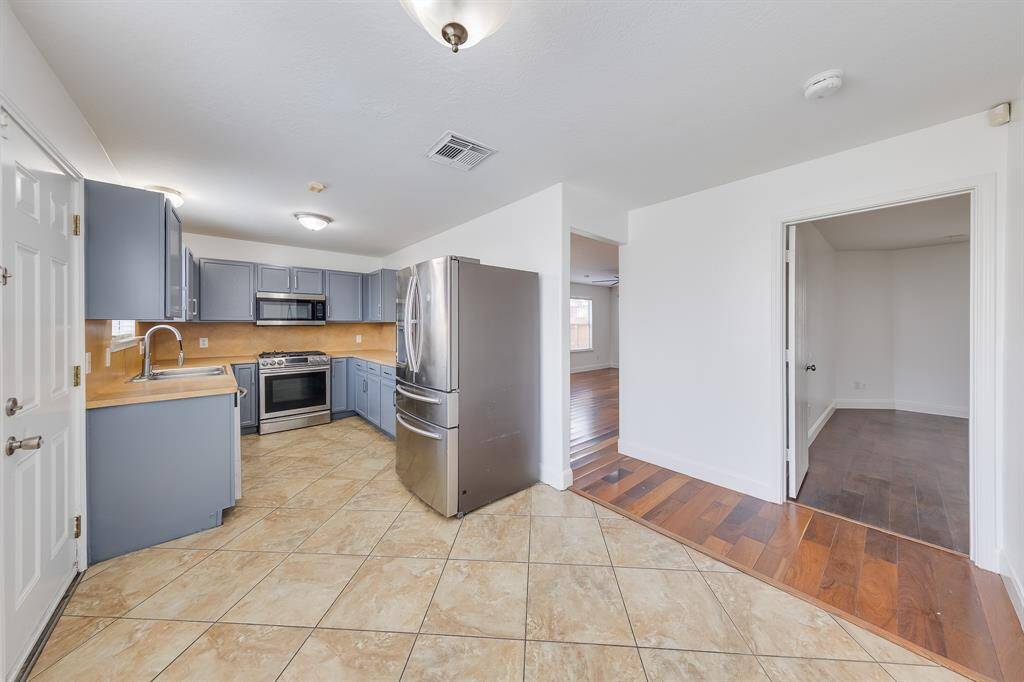 The centrally located kitchen connects easily to the living area and primary bedroom, creating a seamless flow between spaces.