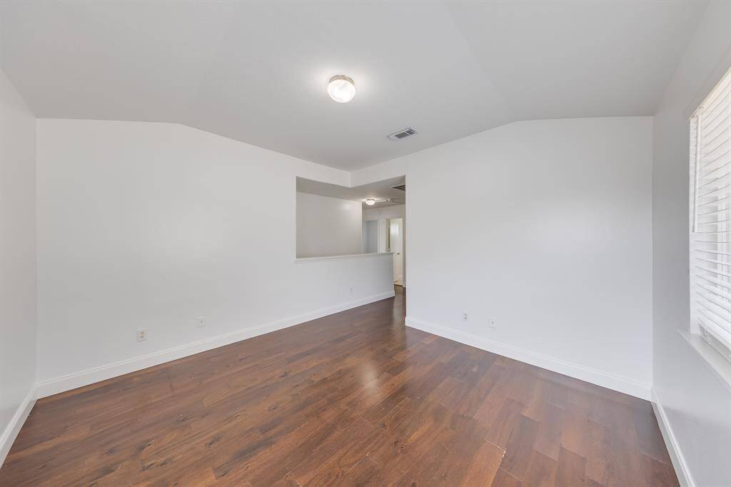 The gameroom greets you upstairs, offering a welcoming space perfect for relaxation and time with loved ones.
