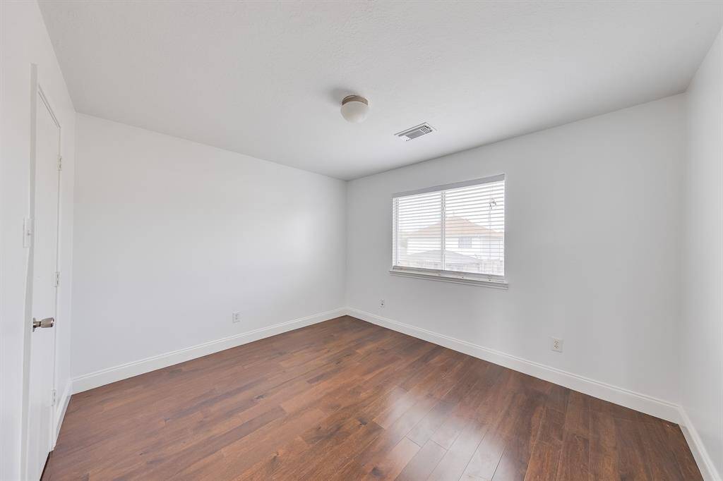 Bedroom two, along with the other bedrooms, makes this home ideal for families, offering plenty of space for everyone to have their own place to retreat.