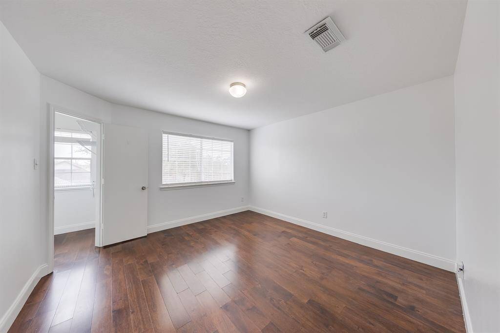Bedroom three is spacious, offering plenty of room to create a comfortable and personalized space.