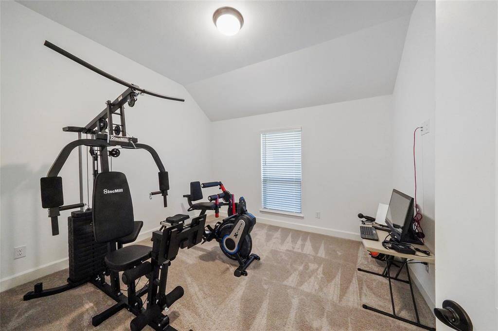 This guest bedroom is currently being used as an exercise room. It is the connected to the Jack & Jill bath.