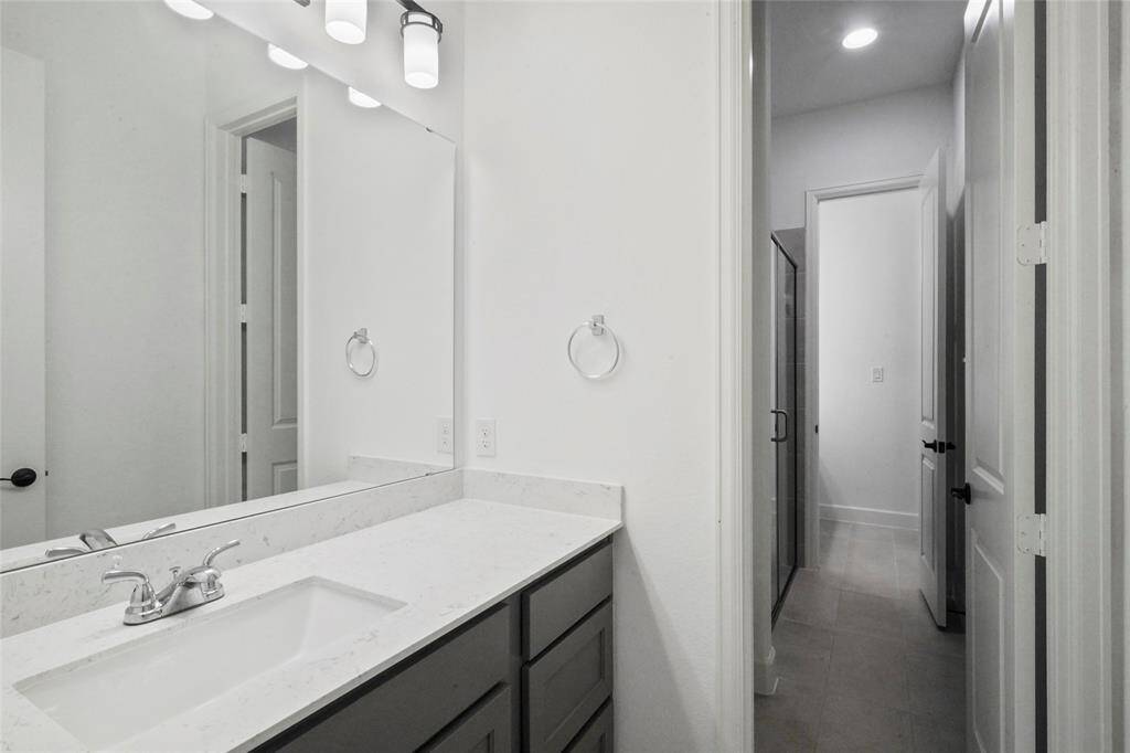 The bath that is just off the exercise room.