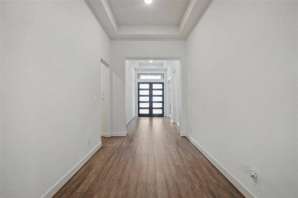 The owners upgraded the builders plan to have a double door entry. Look at the architectural details just in the entry!