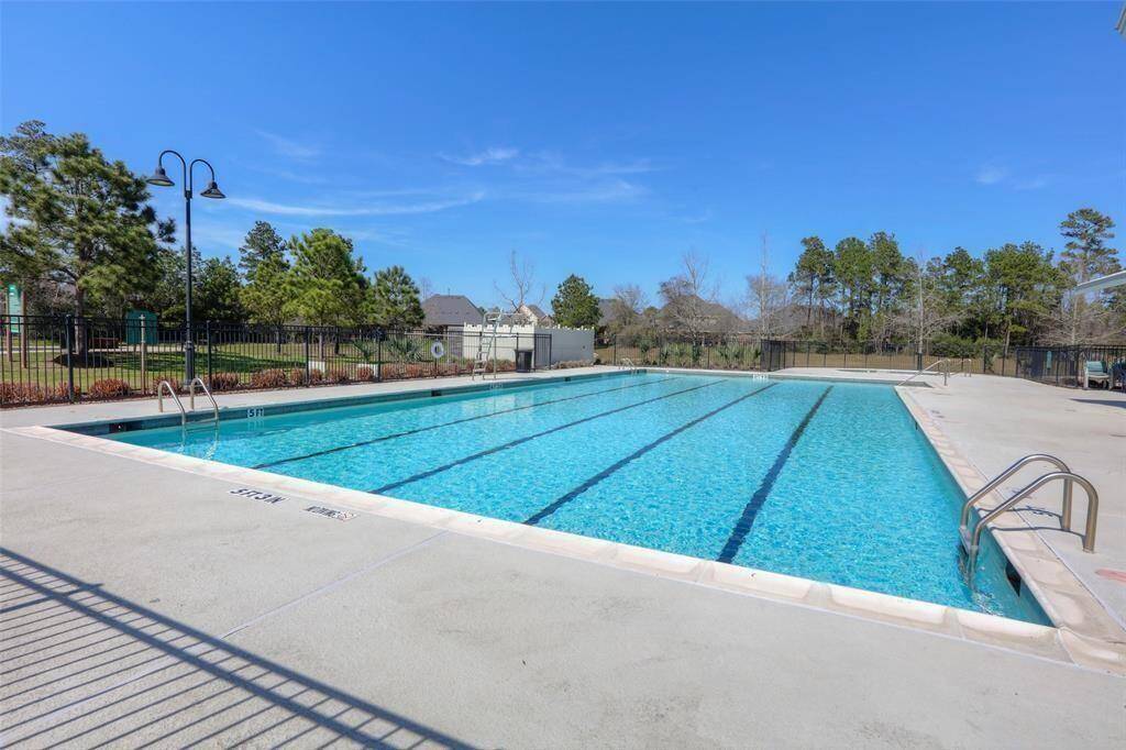 This Olympic sized pool is used for laps and is located in the West section of Harper's Preserve. There's also a spa in the background.