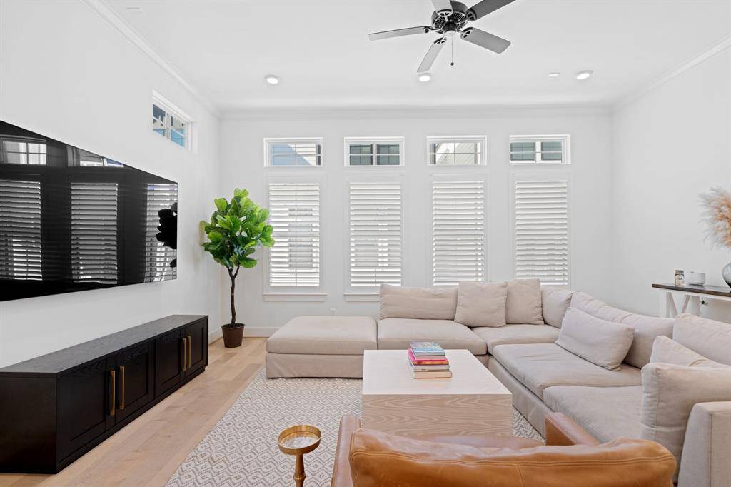This bright and airy living area offers plenty of space for entertaining.
