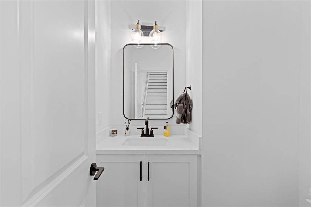 A half bath is conveniently located on the main living floor.